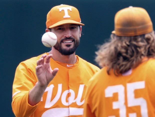 FILE - Tennessee head coach Tony Vitello, left, talks with pitcher Kirby Connell before an NCAA college baseball super regional game against Notre Dame, June 11, 2022, in Knoxville, Tenn. Tennessee suspended Vitello, Friday, Feb. 24, 2023, for the Volunteers' weekend series with Dayton while university officials, Vitello and the NCAA handle a violation in the program. (AP Photo/Randy Sartin, File)