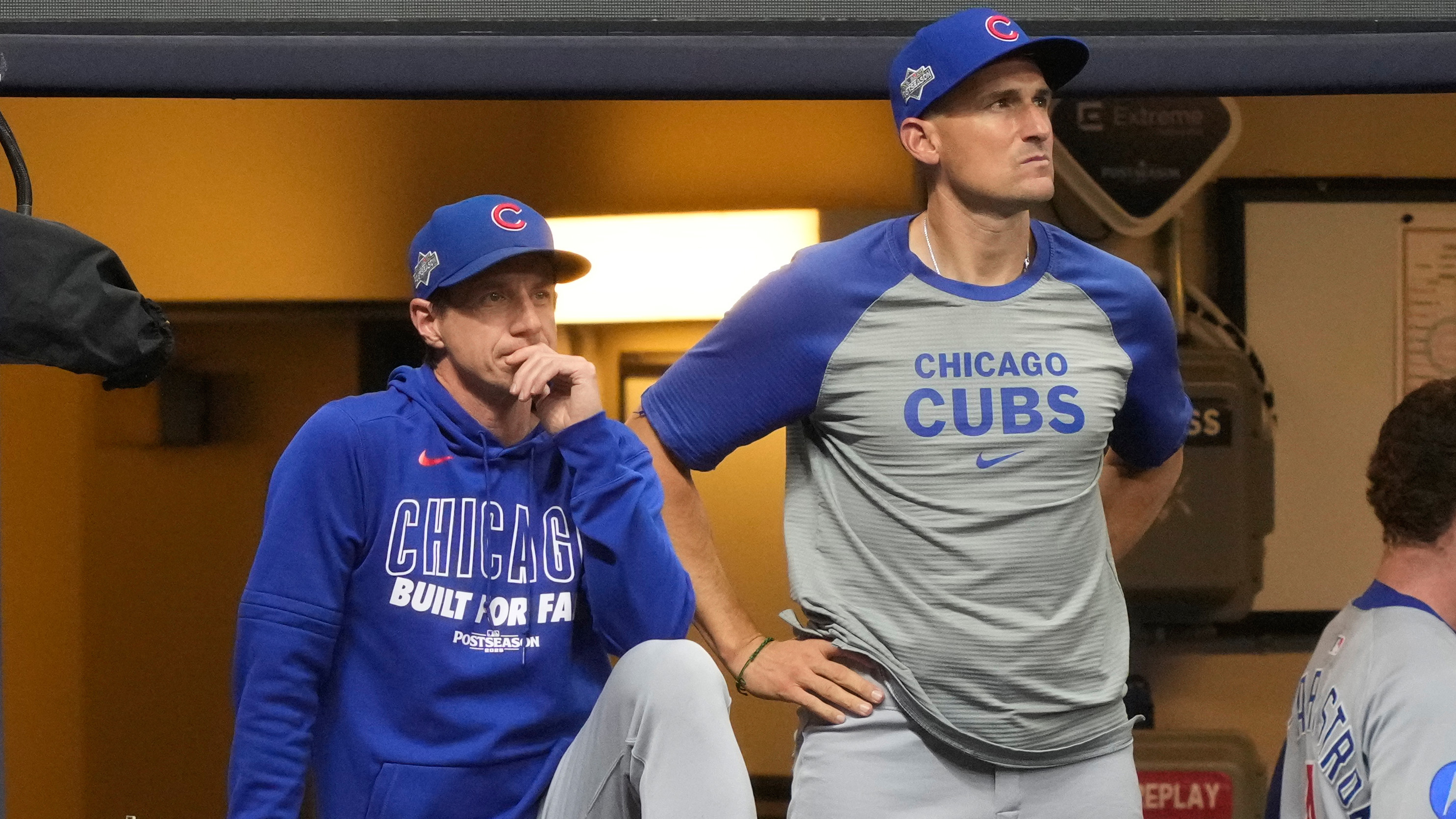 Chicago Cubs manager Craig Counsell and bench coach Ryan Flaherty watch the 7th inning of Game 5 of the NLDS against the Milwaukee Brewers, Saturday, Oct. 11, 2025, in Milwaukee.
