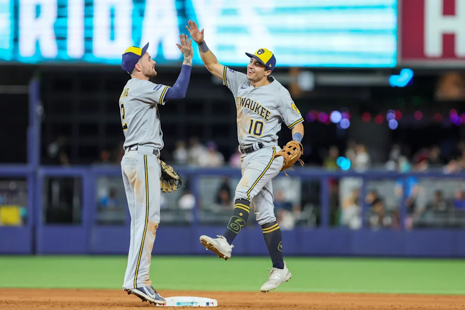 Sep 22, 2023; Miami, Florida, USA; Milwaukee Brewers outfielder Sal Frelick (10) celebrates with second baseman Brice Turang (2) after winning the game against the Miami Marlins at loanDepot Park. Mandatory Credit: Sam Navarro-USA TODAY Sports