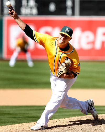 Athletics closer Andrew Bailey throws against the Minnesota Twins during the ninth inning of their game on Sunday, July 31, 2011, at O.co Coliseum in Oakland, Calif. The A's beat the Twins by a score of 7-3. (Aric Crabb/Staff)