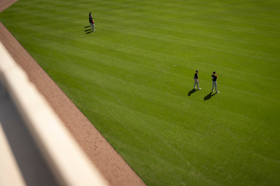 Aerial view of Northeastern and Red Sox players on the field during their spring training exhibition game at JetBlue Park.