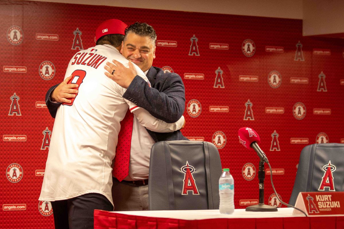 Kurt Suzuki with Angels GM Perry Minasian as he's introduced as Angels Manager.