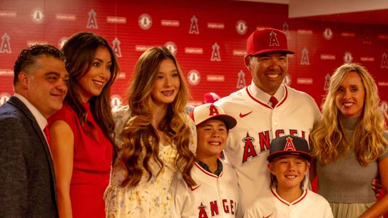 Kurt Suzuki with his family at his introductory press conference as the Los Angeles Angels Manager.