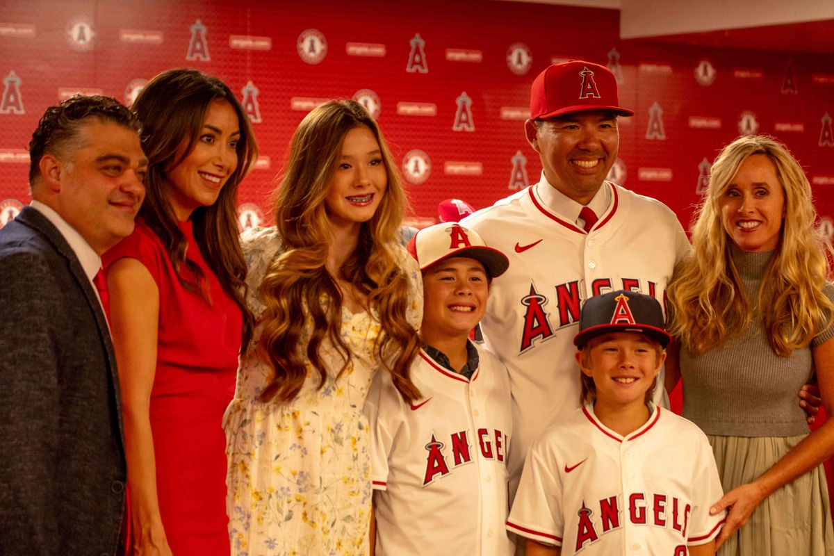 Kurt Suzuki with his family at his introductory press conference as the Los Angeles Angels Manager.