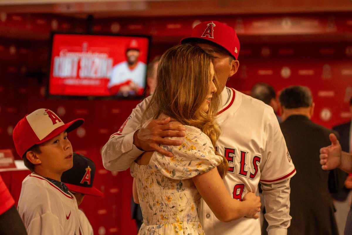 Kurt Suzuki with his family at his introductory press conference as the Los Angeles Angels Manager.