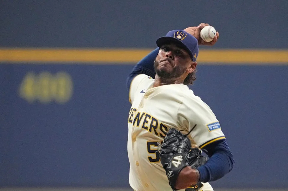 Milwaukee Brewers pitcher Freddy Peralta (51) throws pitch against the Los Angeles Dodgers in the first inning during game two of the NLCS round for the 2025 MLB playoffs at American Family Field. IMAGN IMAGES via Reuters Connect