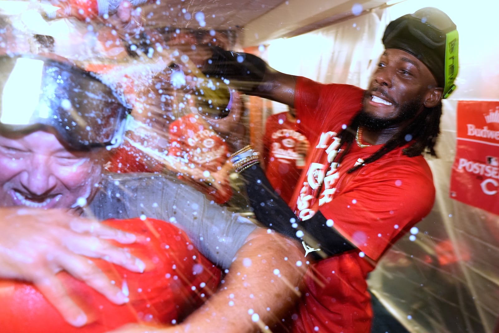Cincinnati Reds' Elly De La Cruz celebrates after making it into the playoffs after a baseball game against the Milwaukee Brewers Sunday, Sept. 28, 2025, in Milwaukee. (AP Photo/Morry Gash)