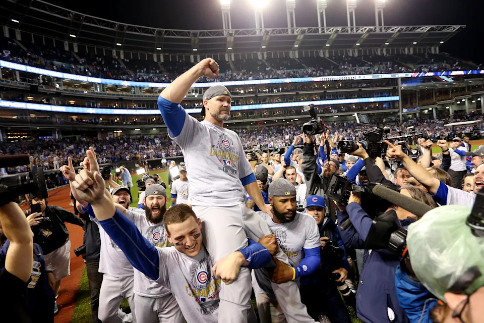 CLEVELAND, OH - NOVEMBER 2:  David Ross #3 of the Chicago Cubs celebrates on the field with his teammates after defeating the Cleveland Indians in Game 7 of the 2016 World Series at Progressive Field on Wednesday, November 2, 2016 in Cleveland, Ohio. (Photo by Rob Tringali/MLB via Getty Images) 
