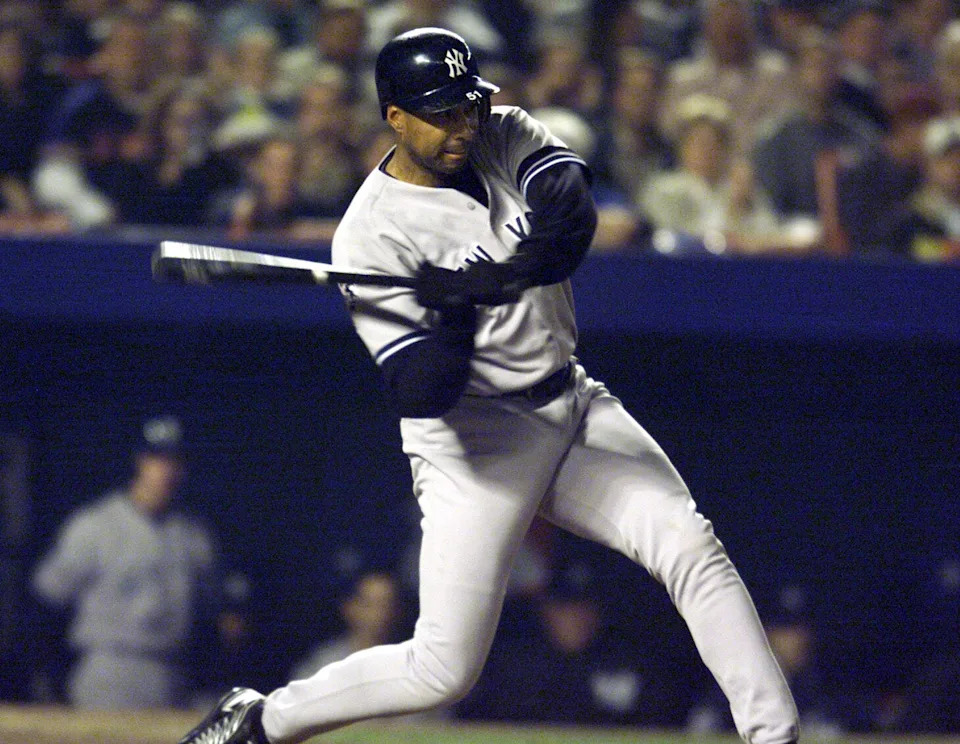 Bernie Williams hits a solo home run in the second inning of the fifth game of the World Series.