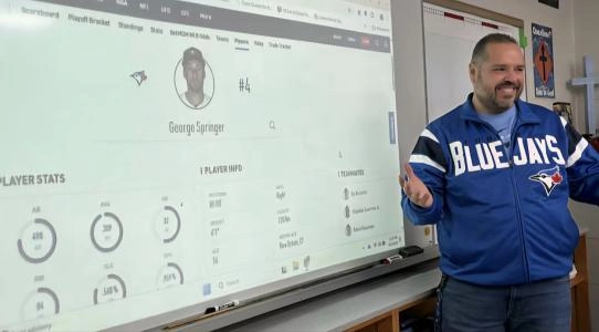 Teacher Rui Castelhano uses baseball statistics to teach Gr. 6 math at Saint Marguerite D'Youville Catholic Elementary School in London, Ont.