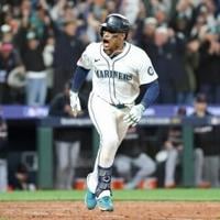 Mariners out-last Tigers 3-2 in 15 innings to advance in MLB playoffs | National