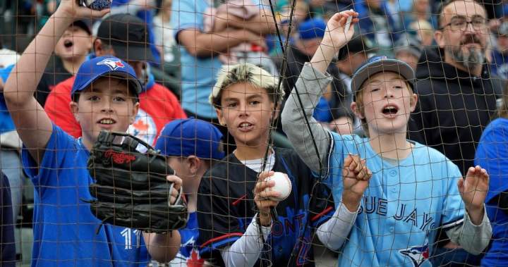 Parents weigh cost of later bedtime to cheer the Toronto Blue Jays as a family