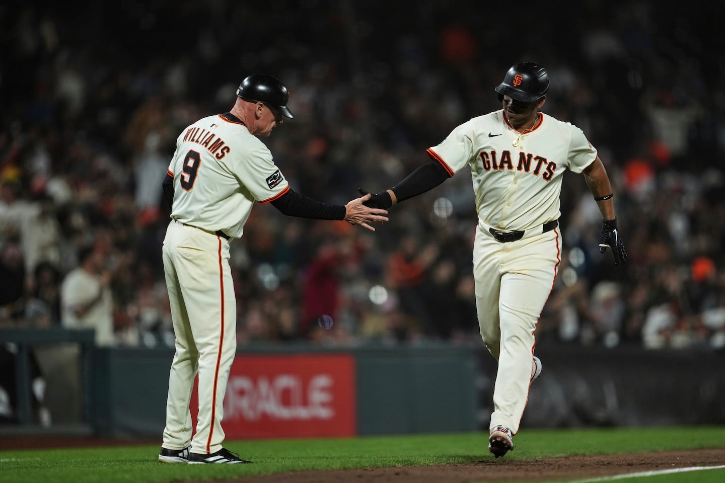 Rafael Devers (right) hit 35 home runs in 2025, including 20 for the Giants after he was traded in June.