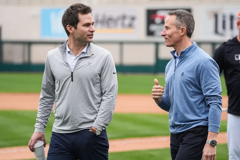 Detroit Tigers president of baseball operation Scott Harris talks to team owner Chris Ilitch during spring training at Joker Marchant Stadium in Lakeland, Fla. on Thursday, Feb. 20, 2025.