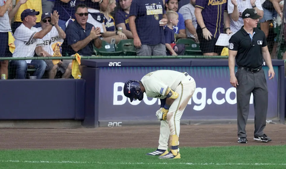 Milwaukee Brewers center fielder Jackson Chourio (11) bends over after suffering a hamstring injury in the second inning of their National League Division Series game against the Chicago Cubs Saturday, Oct. 4, 2025, at American Family Field in Milwaukee, Wisconsin.