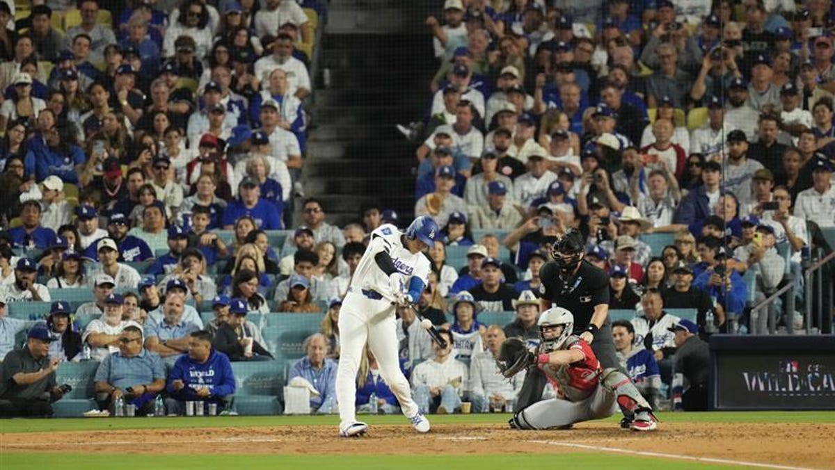Cincinnati Reds routed by Dodgers in playoff opener, face elimination