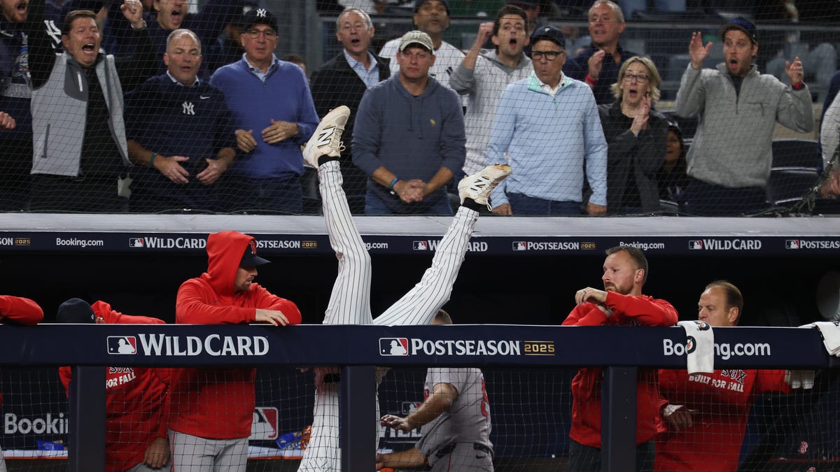 Watch Ryan McMahon flip over dugout railing in Yankees-Red Sox game