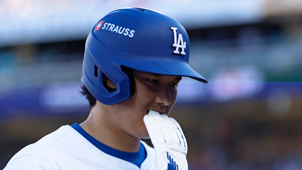 Why MLB teams have STRAUSS ads on helmets during the 2025 postseason