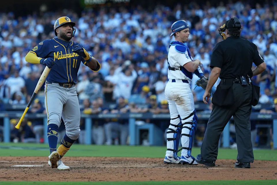 Oct 16, 2025; Los Angeles, California, USA; Milwaukee Brewers center fielder Jackson Chourio (11) reacts against the Los Angeles Dodgers during game three of the NLCS round for the 2025 MLB playoffs at Dodger Stadium. Mandatory Credit: Kirby Lee-Imagn Images