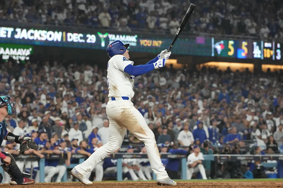 Oct 27, 2025; Los Angeles, California, USA; Los Angeles Dodgers first baseman Freddie Freeman (5) hits a walk off home run in the eighteenth inning against the Toronto Blue Jays during game three of the 2025 MLB World Series at Dodger Stadium. Mandatory Credit: Kirby Lee-Imagn Images© Kirby Lee-Imagn Images