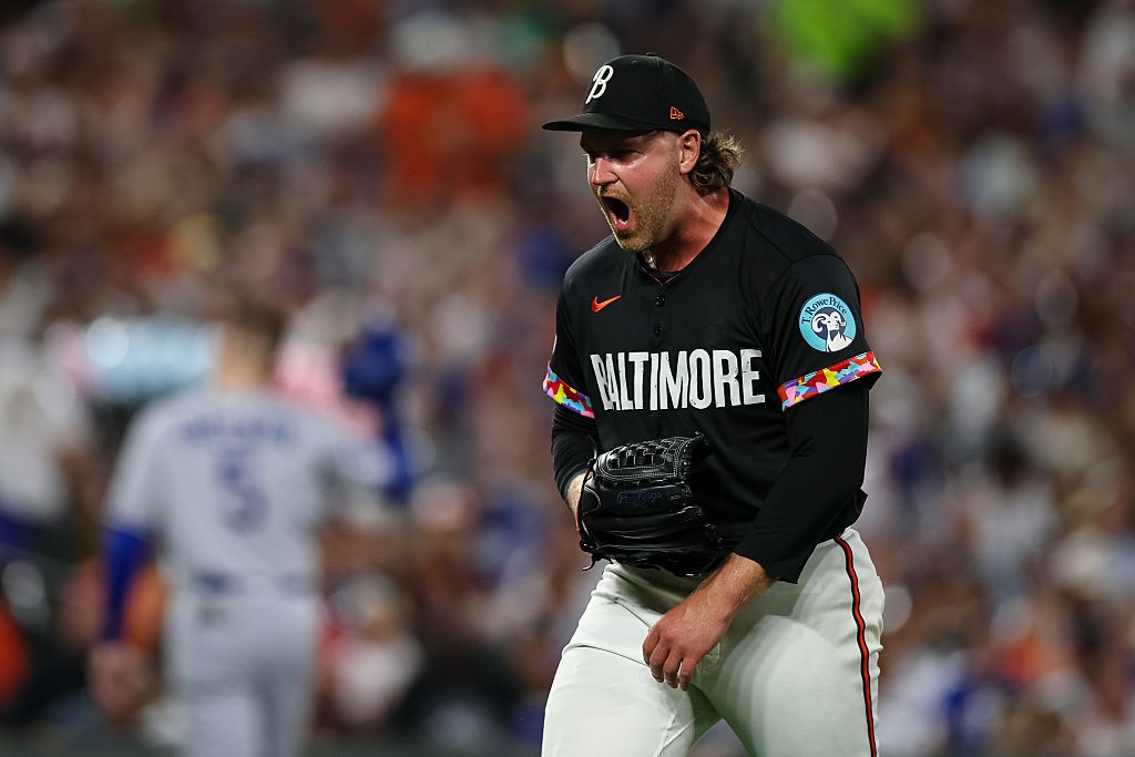 Orioles reliever Dietrich Enns celebrates after pitching during the fourth inning against the Los Angeles Dodgers on Sept. 5.