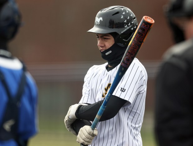Metea Valley's Tyler Gluting (4) comes to the plate in the fifth inning during a nonconference game against Metea Valley Tuesday, April 1, 2025 at Judson University's Hoffer Field in Elgin. (H. Rick Bamman / The Beacon-News)