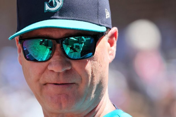Seattle Mariners manager Scott Servais reacts during their game against the Angels on Wednesday afternoon in Seattle. (Kevin Clark/The Seattle Times via AP)