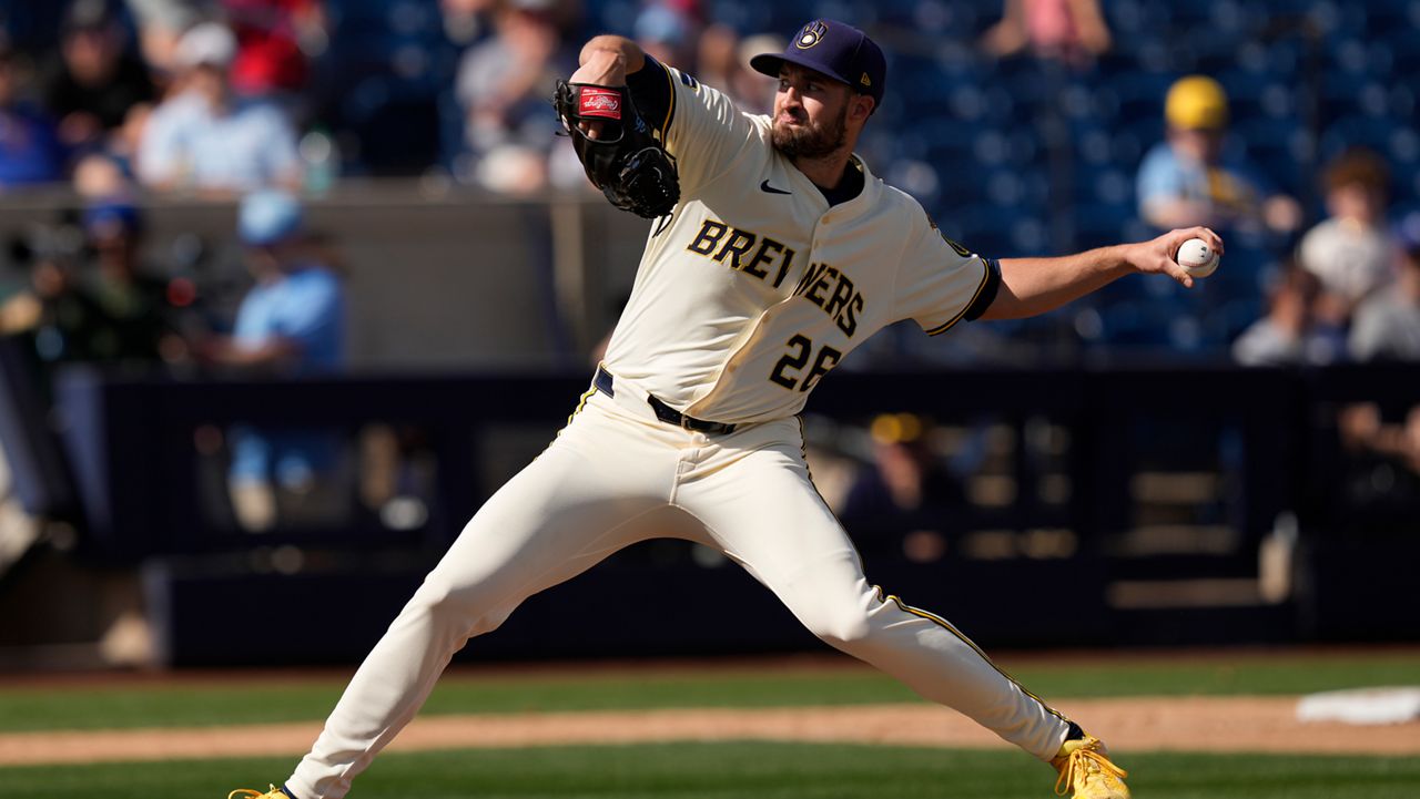 Milwaukee Brewers pitcher Aaron Ashby throws during the fourth inning of a spring training baseball game against the Kansas City Royals, Thursday, Feb. 27, 2025, in Phoenix.