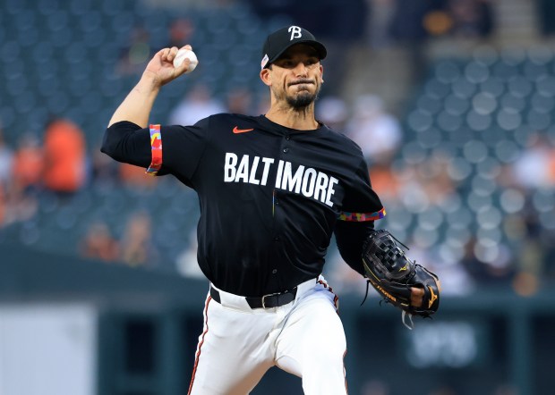 Baltimore Orioles starting pitcher Charlie Morton throws to the plate...