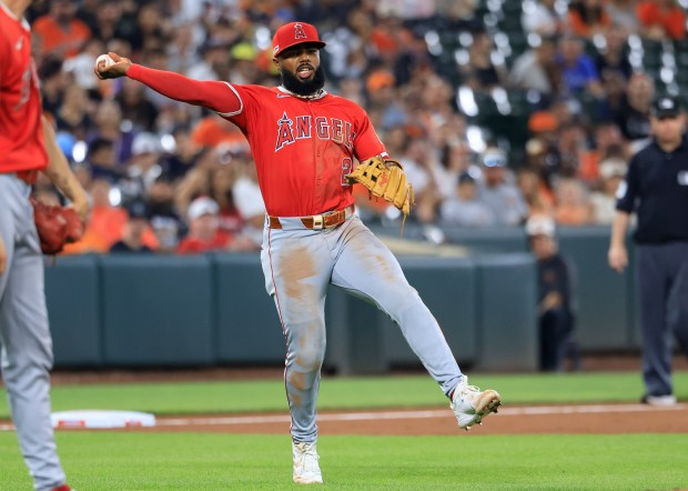 Angels third baseman Luis Rengifo fields a ground ball to...