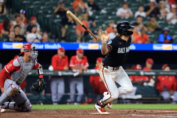 The Baltimore Orioles’ Gunnar Henderson singles in the top of...