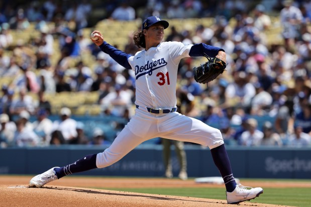 Dodgers starting pitcher Tyler Glasnow delivers against the San Diego...