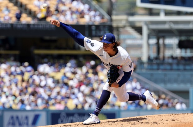 Dodgers starting pitcher Tyler Glasnow delivers against the San Diego...