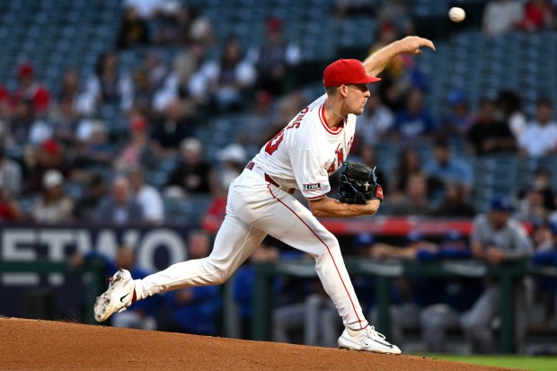 Angels starting pitcher Mitch Farris throws to the plate during...