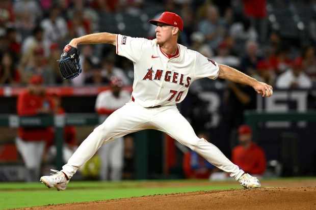 Angels starting pitcher Mitch Farris throws to the plate during...