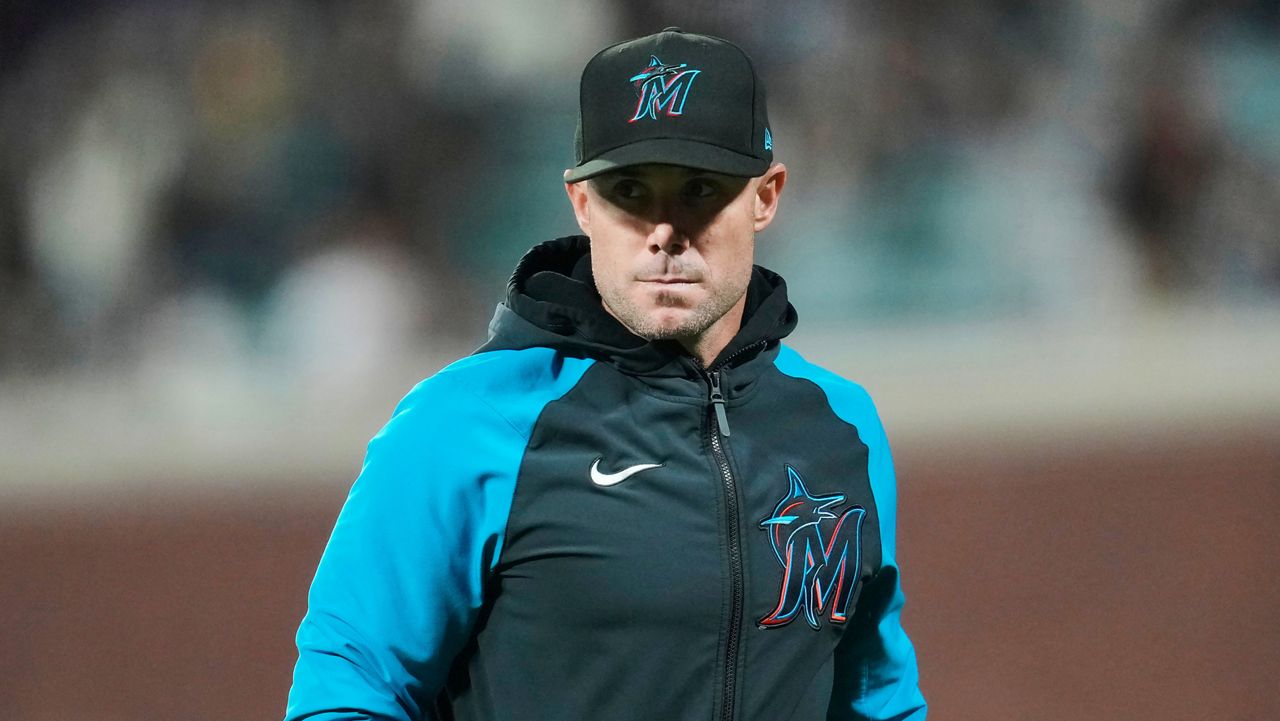 Miami Marlins manager Skip Schumaker walks off the field during the third inning of a baseball game against the San Francisco Giants= in San Francisco, Friday, Aug. 30, 2024. (AP Photo/Jeff Chiu, File)