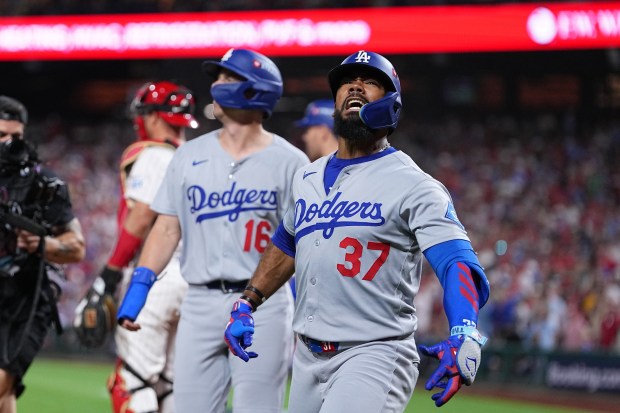 The Dodgers’ Teoscar Hernández celebrates after hitting a go-ahead three-run...