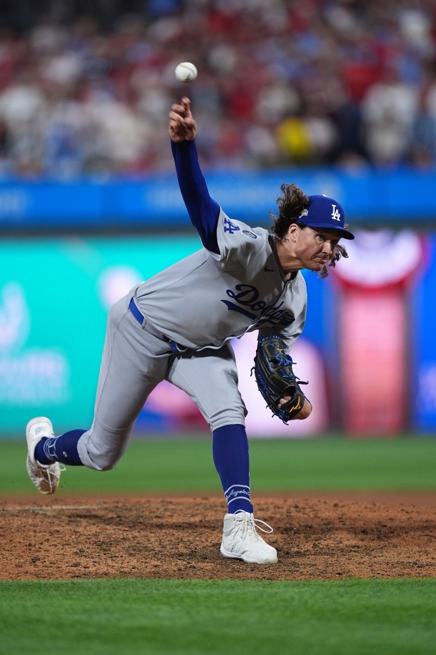 Dodgers relief pitcher Tyler Glasnow throws to the plate during...
