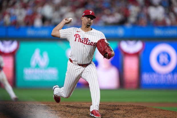 Philadelphia Phillies’ Jhoan Duran pitches during the ninth inning in...