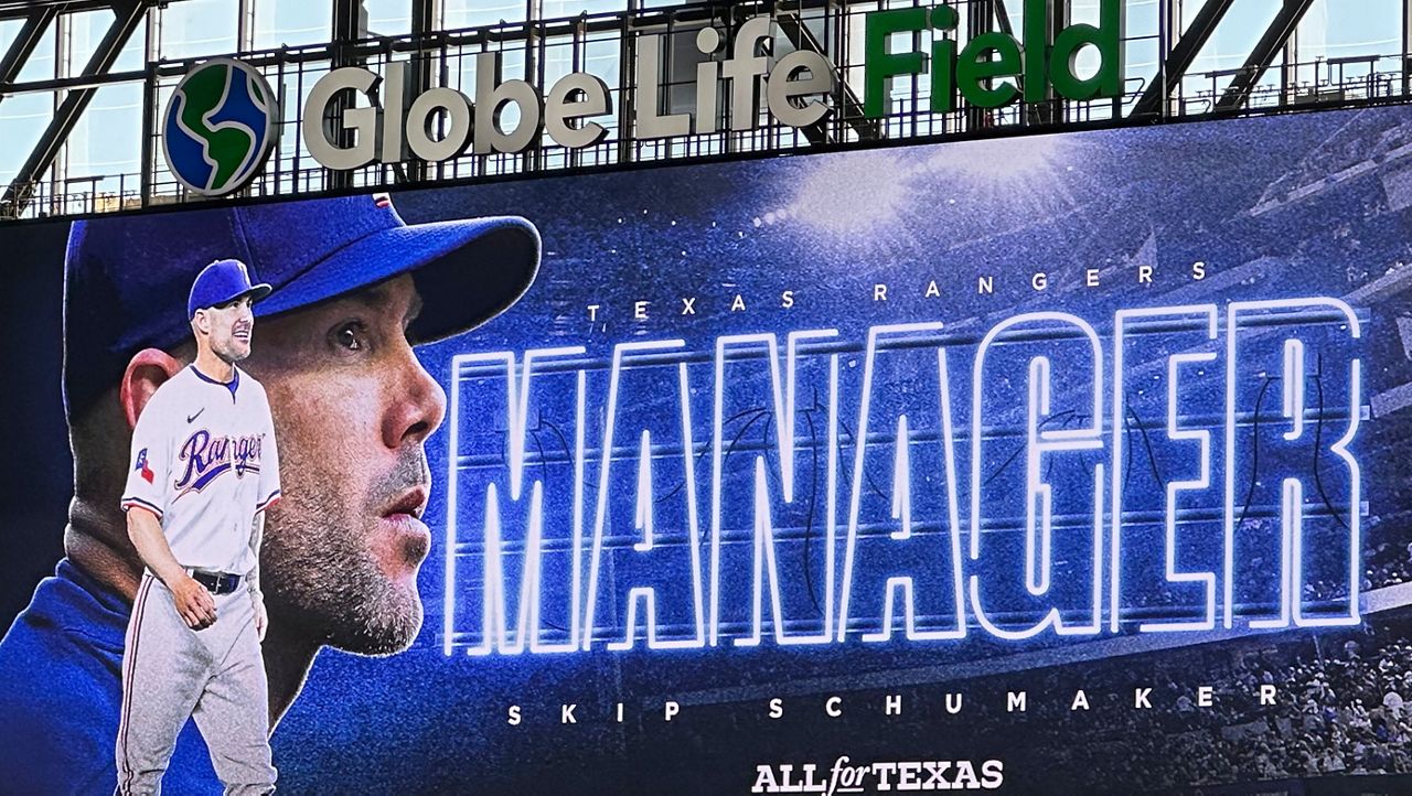 The scoreboard at GolbeLife Field welcomes new Texas Rangers manager Skip Schumaker, Friday, Oct. 10, 2025, in Arlington, Texas. (AP Photo/Stephen Hawkins)