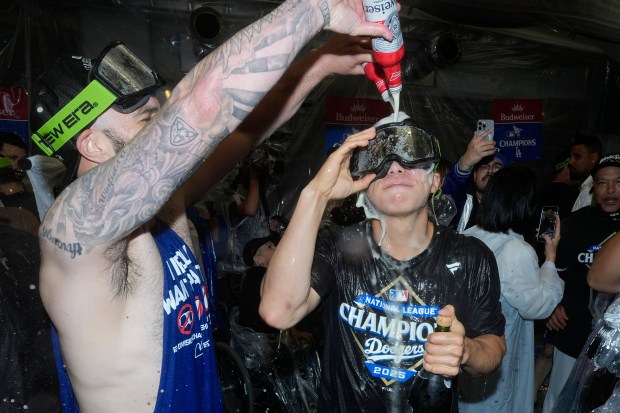 Dodgers infielder Hyeseong Kim celebrates their win against the Milwaukee...