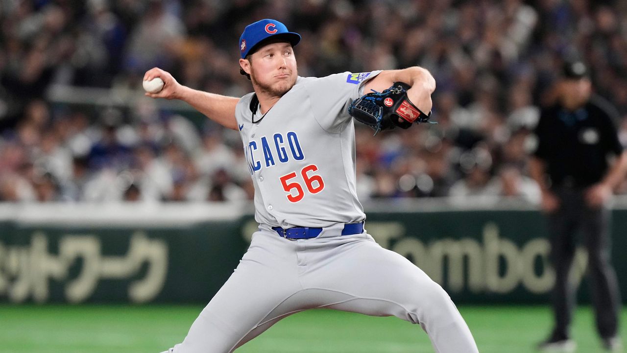 Chicago Cubs relief pitcher Nate Pearson throws to the Los Angeles Dodgers in the fifth inning of an MLB Tokyo Series baseball game in Tokyo, Japan, Wednesday, March 19, 2025. (AP Photo/Eugene Hoshiko, File)