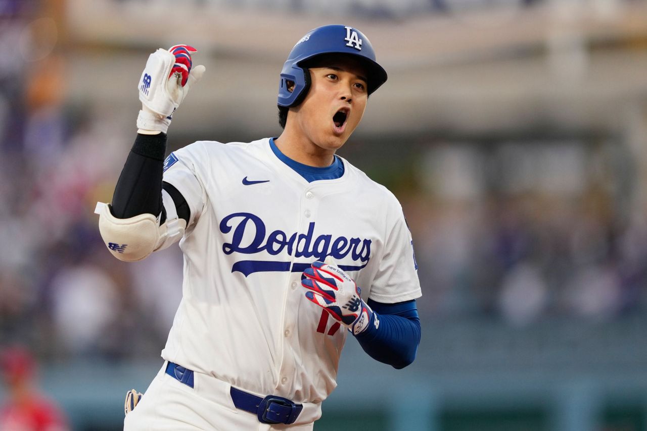 Ohtani homers to lead off Dodgers' NL Wild Card opener
