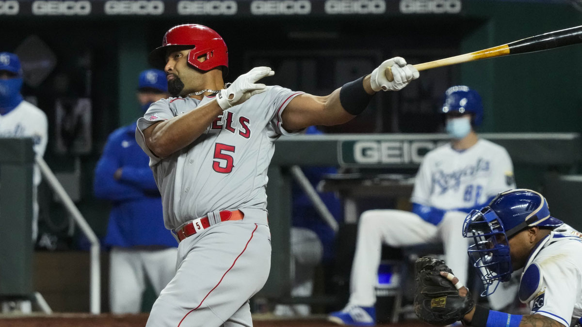 Los Angeles Angels first baseman Albert Pujols (5) hits a single against the Kansas City Royals during the eighth inning at Kauffman Stadium. 