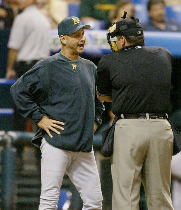 Oakland Athletics bench coach Terry Francona, left, argues with home plate umpire Hunter Wendelstedt, right, after being ejected during the eighth inning against the Tampa Bay Devil Rays, Saturday, Sept. 6, 2003, in St. Petersburg, Fla. The Devil Rays won 7-4. (AP Photo/Scott Audette)