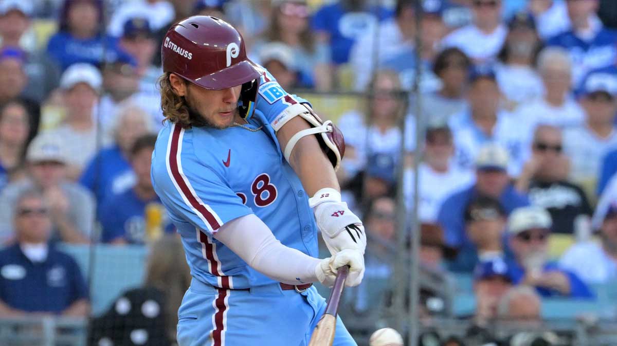 Philadelphia Phillies third baseman Alec Bohm (28) singles in the sixth inning against the Los Angeles Dodgers during game four of the NLDS round for the 2025 MLB playoffs at Dodger Stadium.