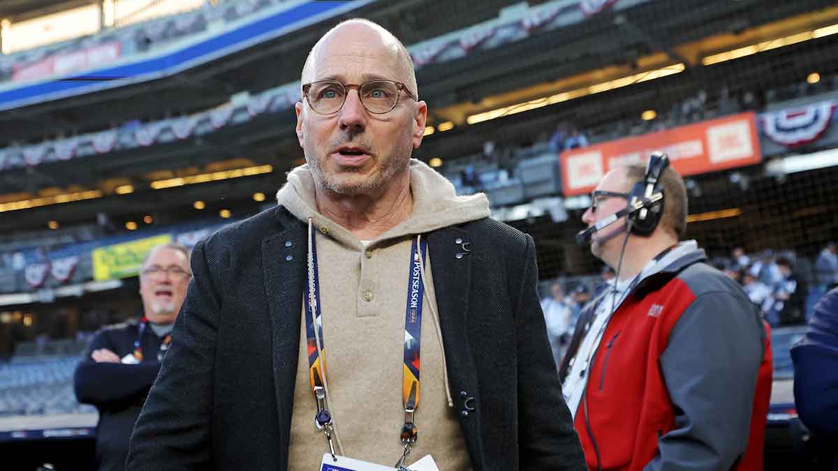 New York Yankees general manager Brian Cashman walks on the field before game three of the 2024 MLB World Series between the New York Yankees and the Los Angeles Dodgers at Yankee Stadium.