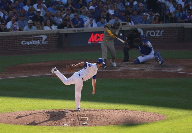 Cubs relief pitcher Drew Pomeranz gets Padres outfielder Gavin Sheets...