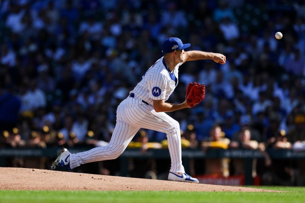 Chicago Cubs starting pitcher Matthew Boyd delivers during the first...