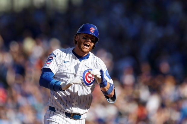 Chicago Cubs catcher Carson Kelly celebrates as he rounds the bases after hitting a solo home run in the fifth inning of game 1 of the National League wild-card series against the San Diego Padres at Wrigley Field, Sept. 30, 2025. (Eileen T. Meslar/Chicago Tribune)
